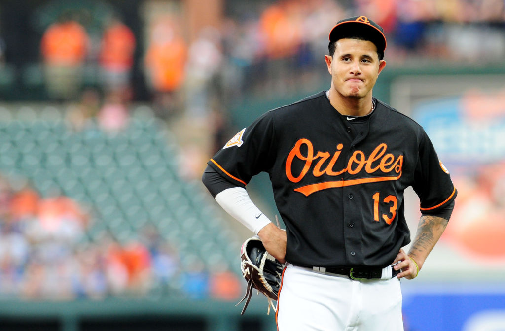 Jul 14, 2017; Baltimore, MD, USA; Baltimore Orioles third baseman Manny Machado (13) reacts after a home run in the first inning by the Chicago Cubs at Oriole Park at Camden Yards. Mandatory Credit: Evan Habeeb-USA TODAY Sports