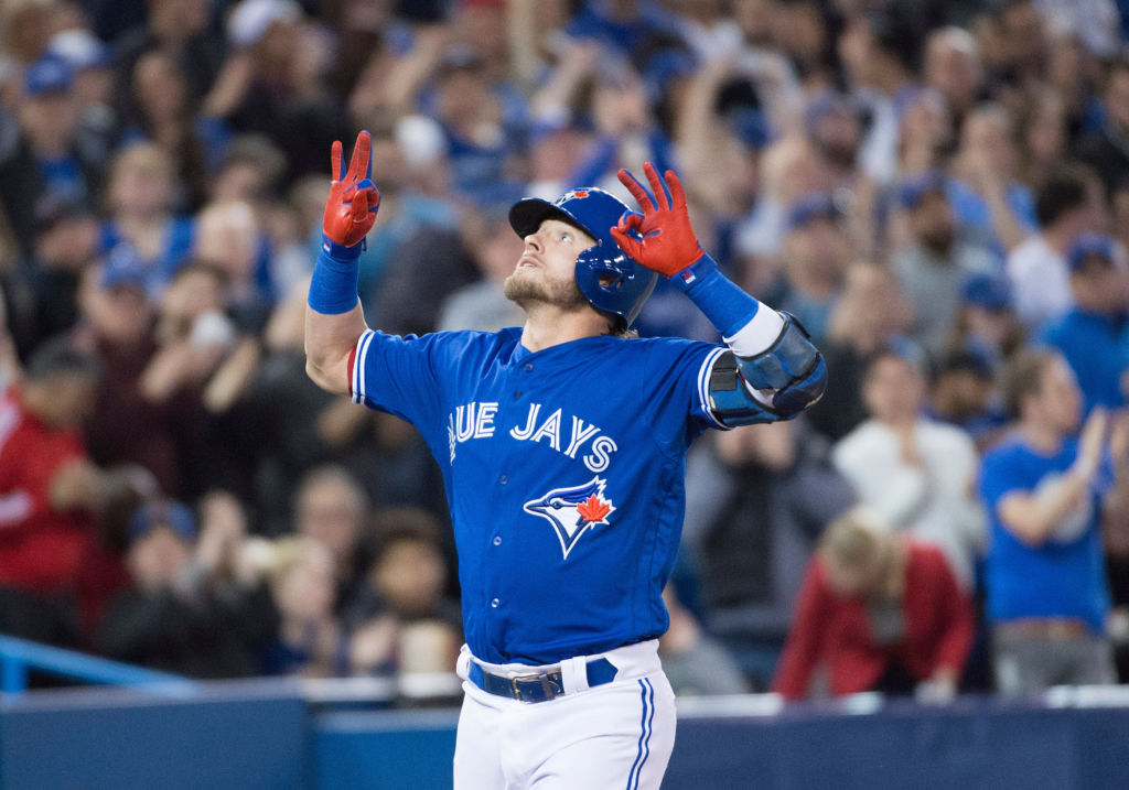 Apr 2, 2018; Toronto, Ontario, CAN; Toronto Blue Jays third baseman Josh Donaldson (20) celebrates after hitting a home run in the sixth inning against the Chicago White Sox at Rogers Centre. Mandatory Credit: Nick Turchiaro-USA TODAY Sports