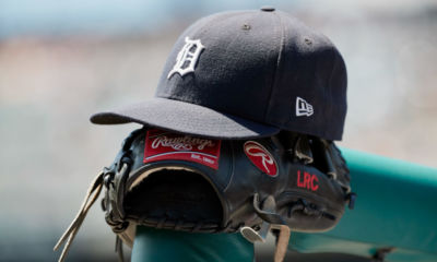 Jun 8, 2017; Detroit, MI, USA; Detroit Tigers hat and glove in the dugout against the Los Angeles Angels at Comerica Park. Mandatory Credit: Rick Osentoski-USA TODAY Sports