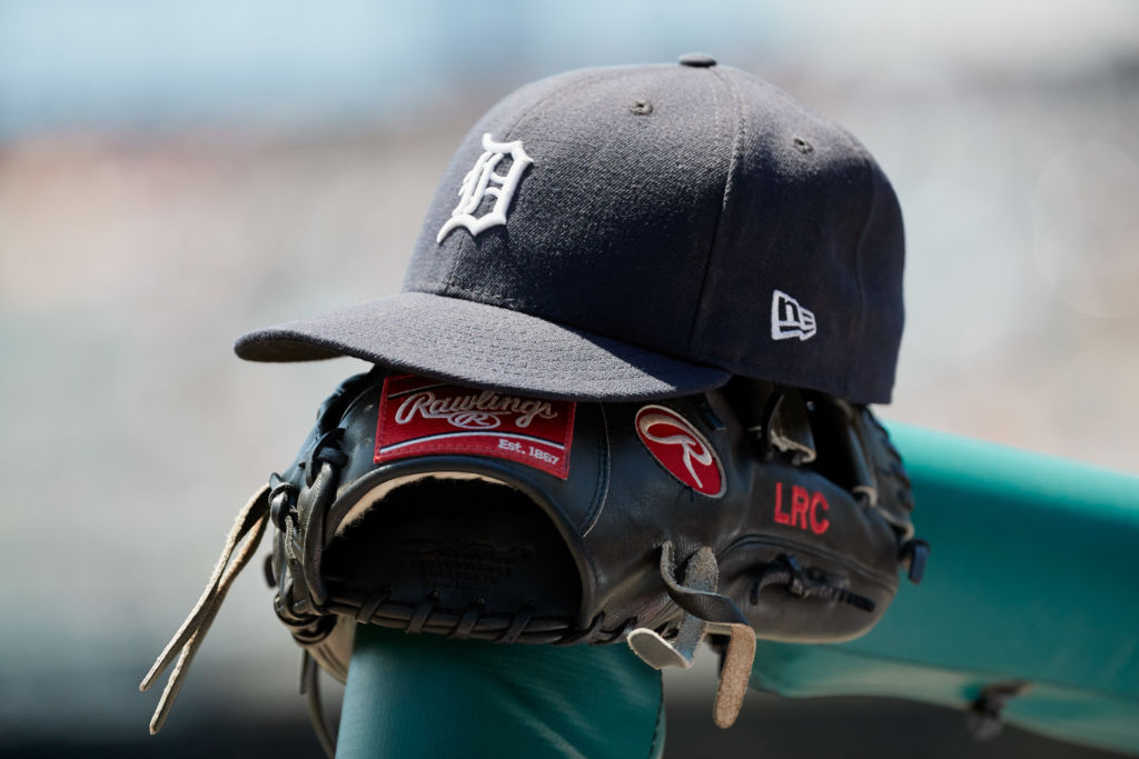 Jun 8, 2017; Detroit, MI, USA; Detroit Tigers hat and glove in the dugout against the Los Angeles Angels at Comerica Park. Mandatory Credit: Rick Osentoski-USA TODAY Sports