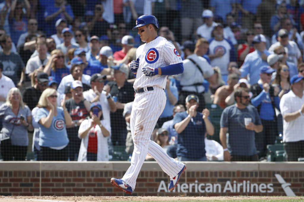 May 2, 2018; Chicago, IL, USA; Chicago Cubs first baseman Anthony Rizzo (44) crosses home plate after hitting a solo home run off Colorado Rockies starting pitcher Tyler Anderson (not pictured) during the fourth inning at Wrigley Field. Mandatory Credit: Kamil Krzaczynski-USA TODAY Sports