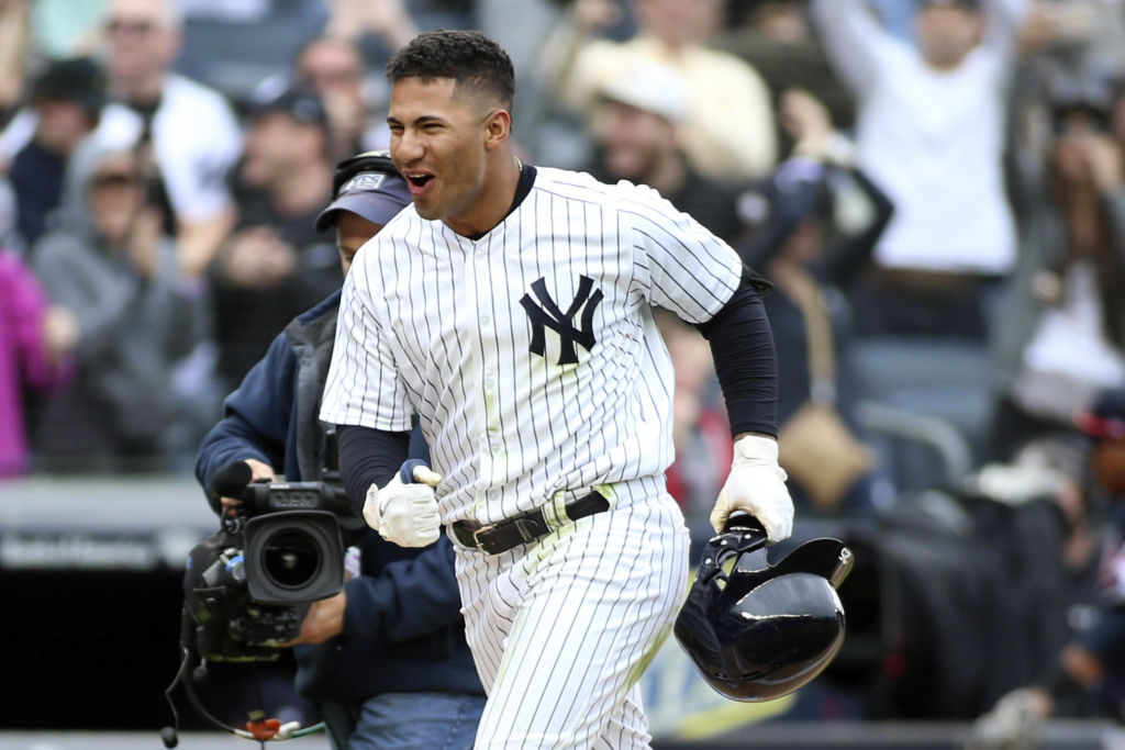 May 6, 2018; Bronx, NY, USA; New York Yankees second baseman Gleyber Torres (25) hits a walk off 3 run home run to beat the Cleveland Indians 7-4 at Yankee Stadium. Mandatory Credit: Wendell Cruz-USA TODAY Sports